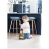 Dyson©-Staubsauger, mit integrierten surrenden bunten Kugeln.