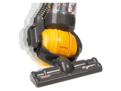 Dyson©-Staubsauger, mit integrierten surrenden bunten Kugeln.